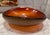 Simple sophistication with this large orange catchall bowl with slight gold flecking. No markings - in the style of Murano...