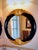 Beautiful Black and Gold Mirror that can be used in many areas of a home or office. This Mirror was purchased at a very...