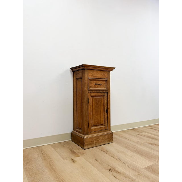 This characterful antique primitive rustic pedestal is a genuinely appealing and historically considered decorative find....