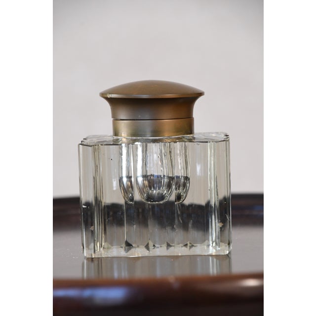 Bring classic elegance to your desk or display with this antique crystal inkwell, featuring a striking geometric form and...