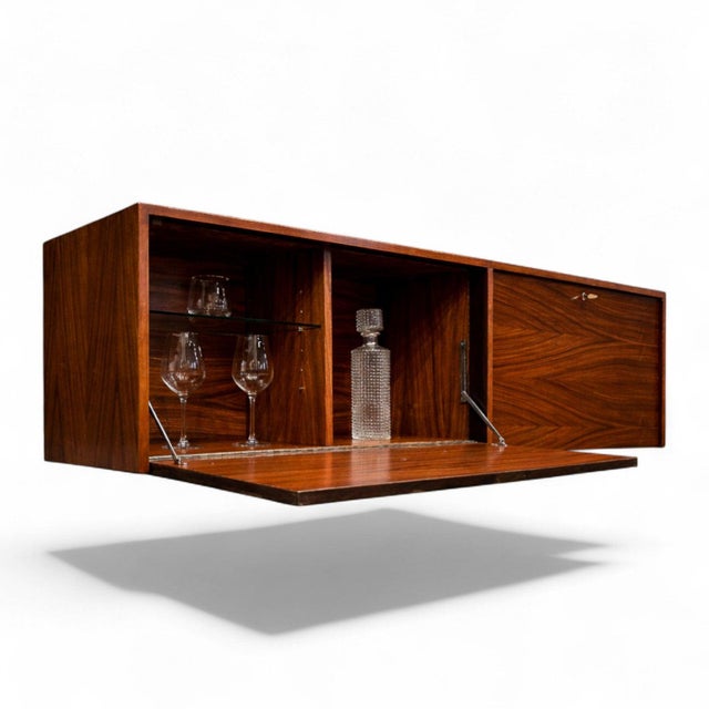 Designed in the 1950s by Carlo Hauner, this rare floating bar or sideboard showcases Hauner’s early mastery of proportion,...