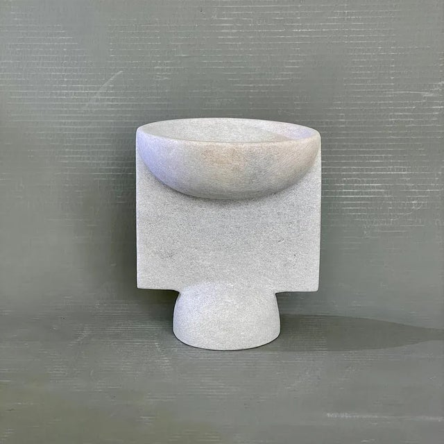 Hand carved marble vessel by tom von kaenel. Materials: marble. Dimensions: w 17 x d 17 x h 20 cm. this piece is...