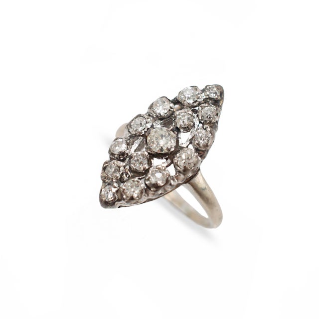 Gender: Ladies Metal Type: 14K White Gold Ring Size: 5.75 Width: 21.75 mm to 10.45 mm Thick: 1.45 mm Weight: 4.04 grams...