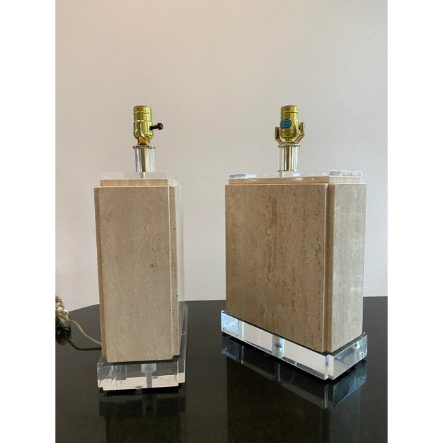 Striking and sculptural, this pair of vintage table lamps blends geometric form with natural elegance. Likely Italian...