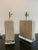 Striking and sculptural, this pair of vintage table lamps blends geometric form with natural elegance. Likely Italian...
