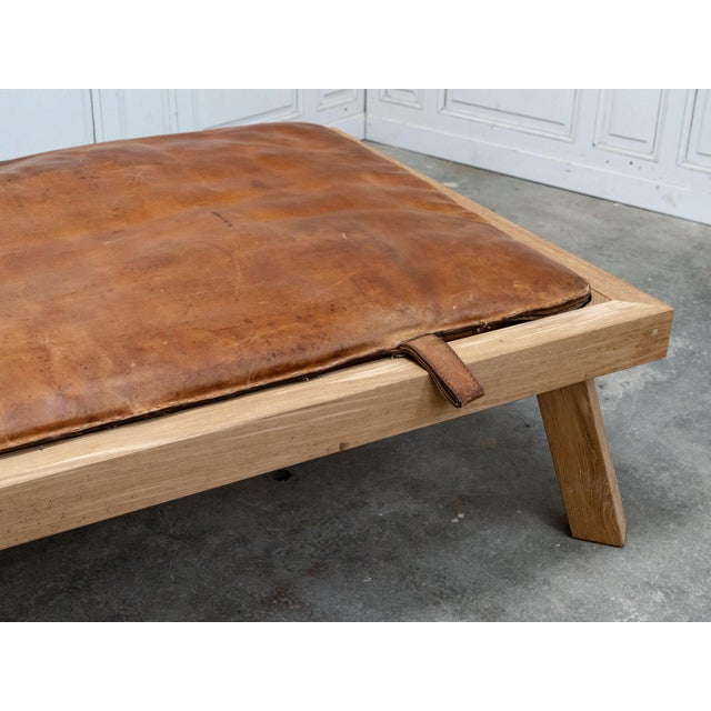 A unique piece where contemporary design elevates an object steeped in history. This daybed was crafted from an authentic...