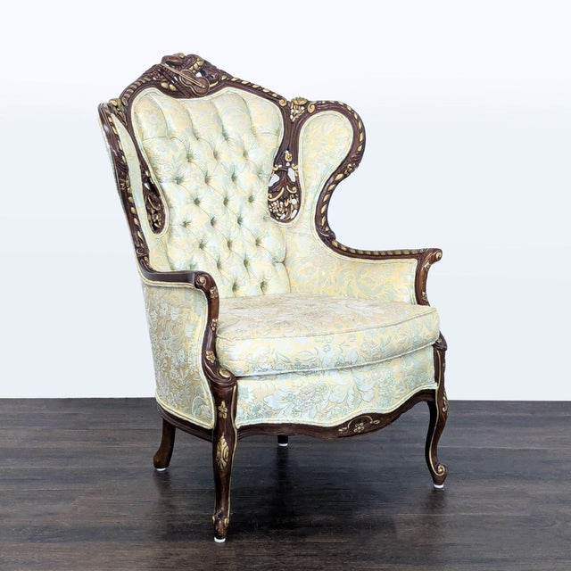 This victorian style lounge chair features a tall, tufted backrest and elegant floral upholstery. The dark wood frame is...