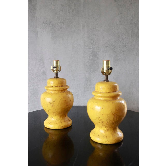 Enhance your space with a charming pair of vintage yellow pottery table lamps from Belgium, dating back to the stylish...