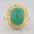 Gemstone Information: - Natural Chrysoprase - Size - 12 x 9 mm Cut - Oval Cabochon Color - Green Metal: 14k Yellow Gold...