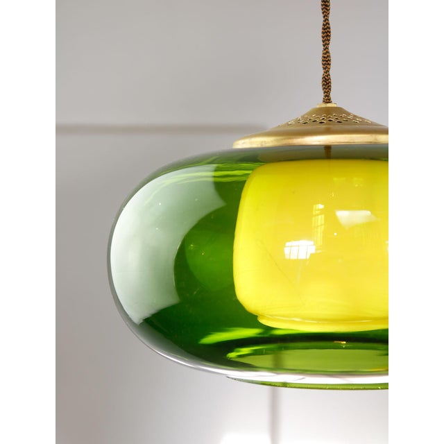 Lamp's cover is made of genuine brass material complementing this vintage item nicely with it's golden colour. total...