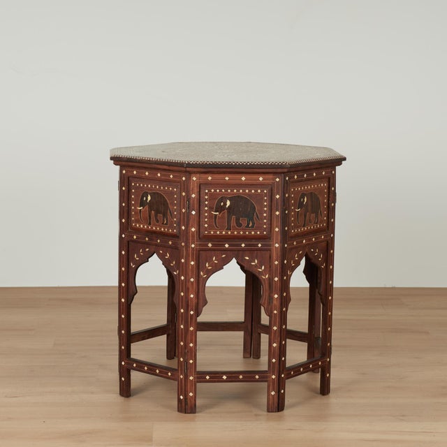 Impressive antique Anglo Indian stand or table crafted in mahogany in an octagon form featuring a mesmerizing...