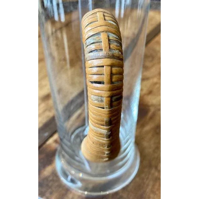 This is a wonderful Art Deco 1930's Carl Aubock Martini Pitcher and Stir Stick. Glass and wicker pitcher. The stir stick...