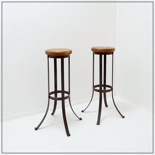 Industrial style - Bar Stools Measures : Base : Ø 53cm Seat : Ø 27cm H:80cm Materials : Oak and Wrought iron Pair of...