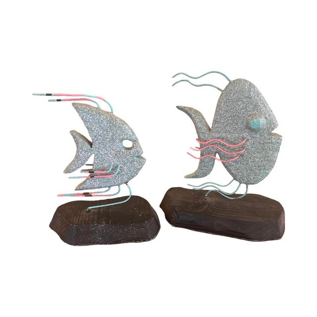 A striking pair of vintage Postmodern tropical fish sculptures by California Designs by Gary, Laguna Hills, California....