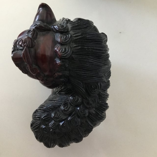 Burgundy Pair of Early 20th Century Hand Carved Foo Dogs For Sale - Image 8 of 9