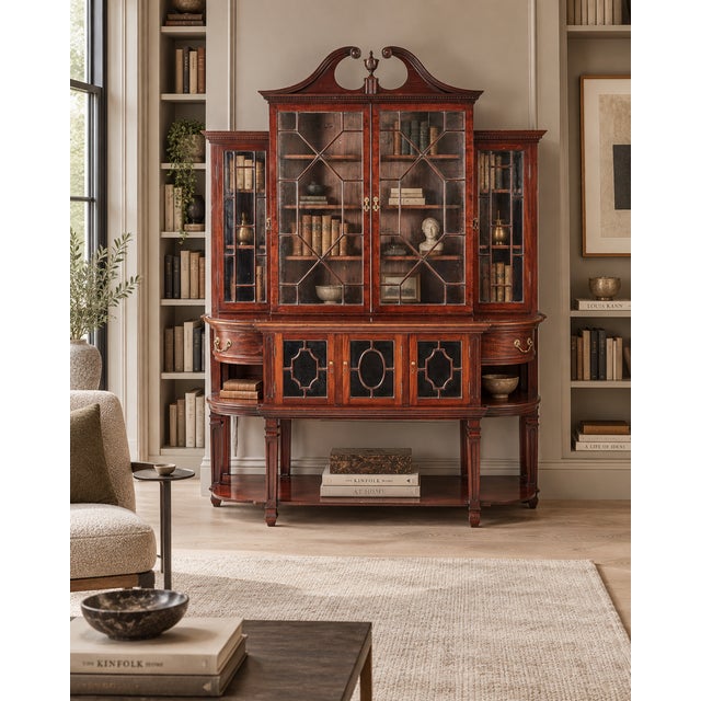 A superb quality antique Victorian mahogany breakfront bookcase and display cabinet dating to circa 1870. This is a...