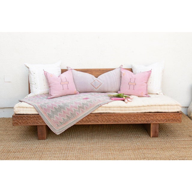 This 84-inch modern daybed sofa is a stunning intersection of Moroccan artistry and Contemporary Minimalism. Crafted from...