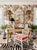 A large wonderful wicker and bamboo Coastal regency carved palm tree top dining table or desk. The table features 2 large...