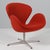 The swan chair, original upholstered with deep orange/red wool fabric Made by Fritz Hansen. This iconic chair is one of...