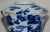 Blue and White Asian Ceramic Art Piece With Wooden Stand For Sale - Image 11 of 12