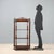 Louis Philippe étagère crafted in walnut, featuring four trapezoidal shelves that offer an elegant functional and...