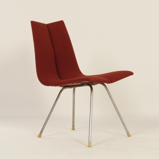 ‘GA’ chair designed by Hans Bellmann for Horgenglarus Switzerland in about 1955. Double moulded plywood shell with red...
