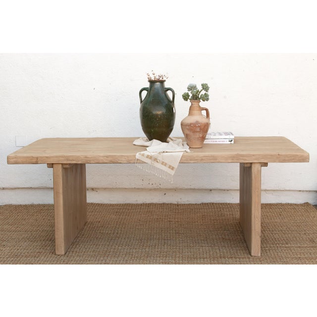 The Bastide keeps its proportions even and its details honest. Two solid panel legs carry the top, no stretcher bar, no...