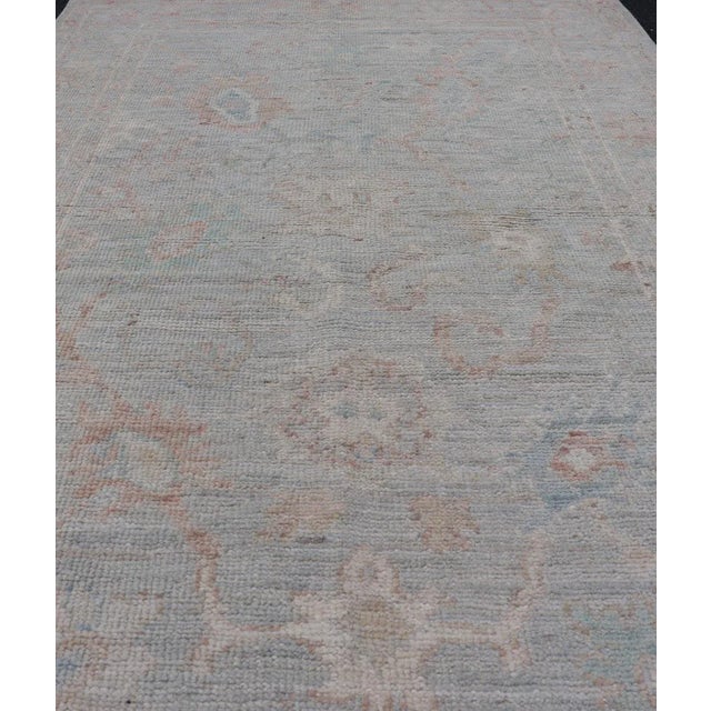 Modern Pastel Colored Hand-Knotted Modern Oushak With Light Blue-Gray Background For Sale - Image 3 of 11
