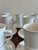 A beautifully understated set of vintage Johnson Brothers Tivoli cups and saucers in crisp white ceramic, offering...