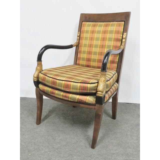 French Empire style chair, fruitwood frame with fish carved arms with gold gilt and ebonized finish, plaid upholstery....