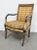 French Empire style chair, fruitwood frame with fish carved arms with gold gilt and ebonized finish, plaid upholstery....