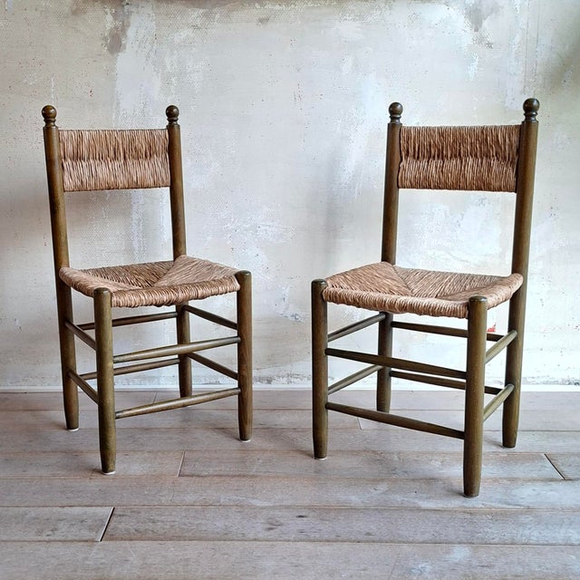 Colour of the chairs is a greenish brown.