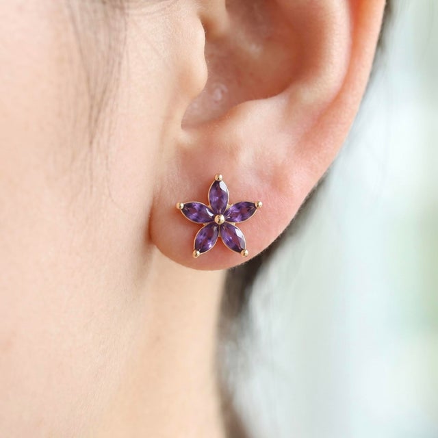 Delicate, feminine, and timeless, these Amethyst Flower Stud Earrings are designed to bring a touch of natural beauty and...