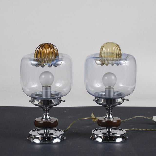 Pair of 1970s lampshades including two-tone glass hood: transparent and amber yellow upper part, steel-coloured metal...