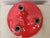 Red Triteti wall lamp designed by Vico Magistretti for Artemide in the 1970s. It shows normal signs of wear due to age and...
