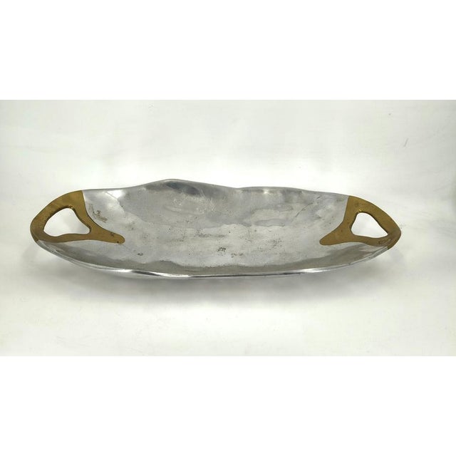 Rare brutalist design tray by David Marshall made from brass and aluminum. Very decorative piece. Good condition with the...