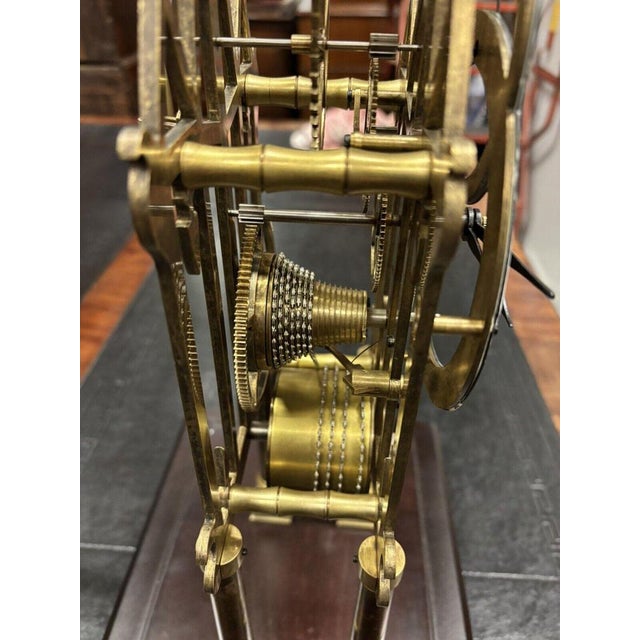 Chain Fusee Cathedral Skeleton Clock with Case And Key. Ticking away nicely Sizes 54 cms tall, 34 cms wide, 24 cms depth....