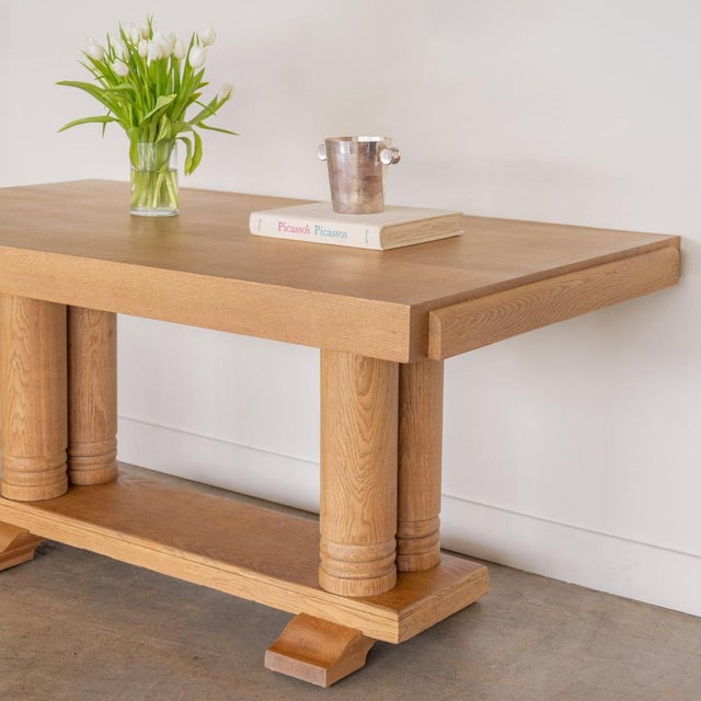 Incredible wood table by Charles Dudouyt, made in France, 1940's. Large rectangular parquet top with four thick carved...