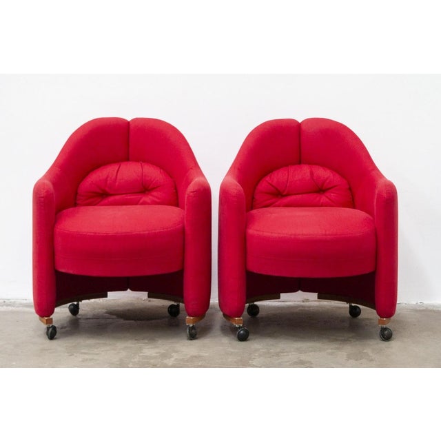 4 Red Armchairs with Wheels from the 80s Enveloping shape and soft lines, soft padding covered in cotton, fixed lumbar...