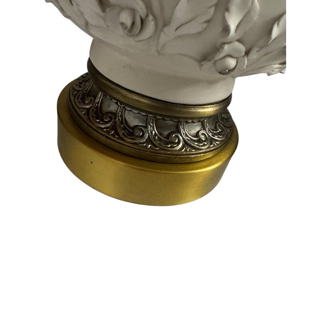 Vintage blanc de chine pair gourd table lamps in the style of Marbro, with intricate hand sculpted floral motifs, on brass...