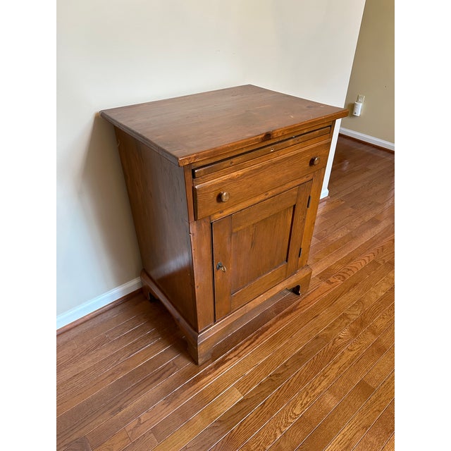 Vintage wood cabinet with drawer and pull-out table