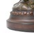 A whimsical large side table formed by three bronze-finished monkeys supporting a round glass top. The sculptural base is...