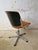 Iconic 1960s swivel chair designed by Giancarlo Piretti for Anonima Castelli. Die-cast aluminum frame, five-star base, and...