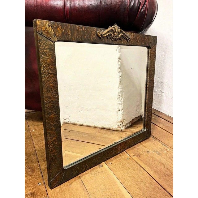 English Arts and Crafts Hammered Copper Mirror Material: Hammered copper, bevelled mirror glass An attractive English Arts...