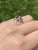 The Osborne Park: Yellow Gold Sapphire and Diamond Designer Ring. This vintage ring centers on a 0.40 carat marquise...