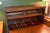 This is a heavy & solid wood antique desk. Not sure on the wood type, possible pine. I was told it came from a railway...