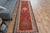 Vintage Hand-Knotted runner rug is a semi-antique vintage area rug. The '70s Eastern region of Anatolia's unique rug is...