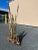 A beautiful brutalist mixed metal sculpture on a Burled wood base. It featured 7 cattails in different heights as well as...