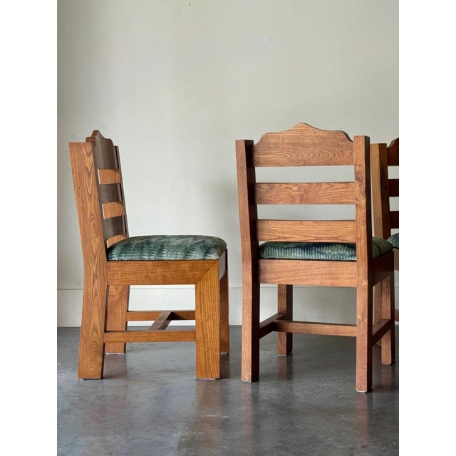 Absolutely solid and heavy 1960s brutalist oak chairs. Each weighs over 25lbs. We had these redone in Kravet Couture...