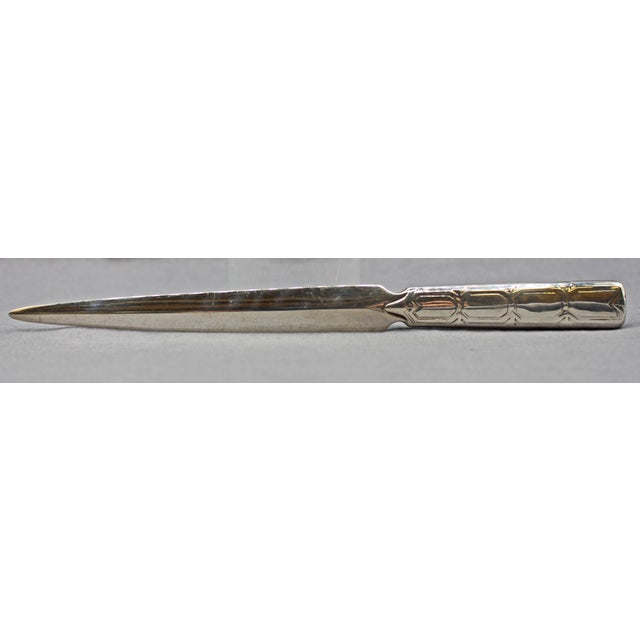 Tiffany & Co. sterling silver letter opener, 1947-1955. Art Deco-Art Moderne design. Marked 17218B / 8435 with hallmark...
